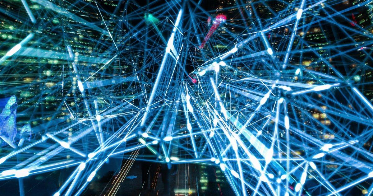 Abstract network of blue light lines linking glowing points
