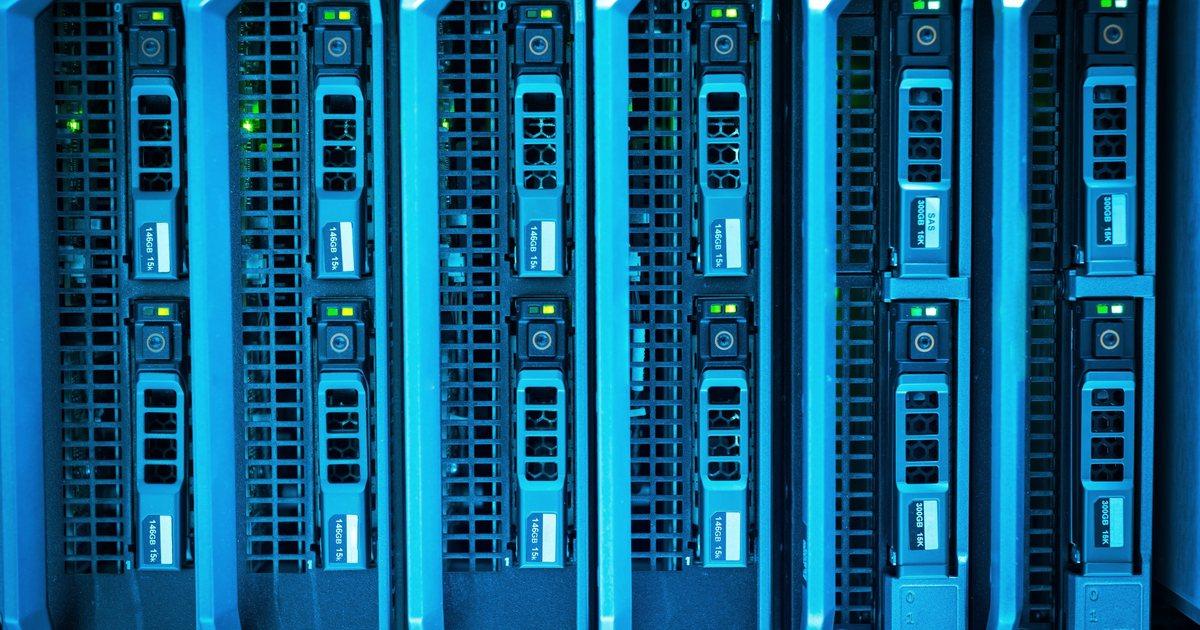 Row of blade servers lit in blue
