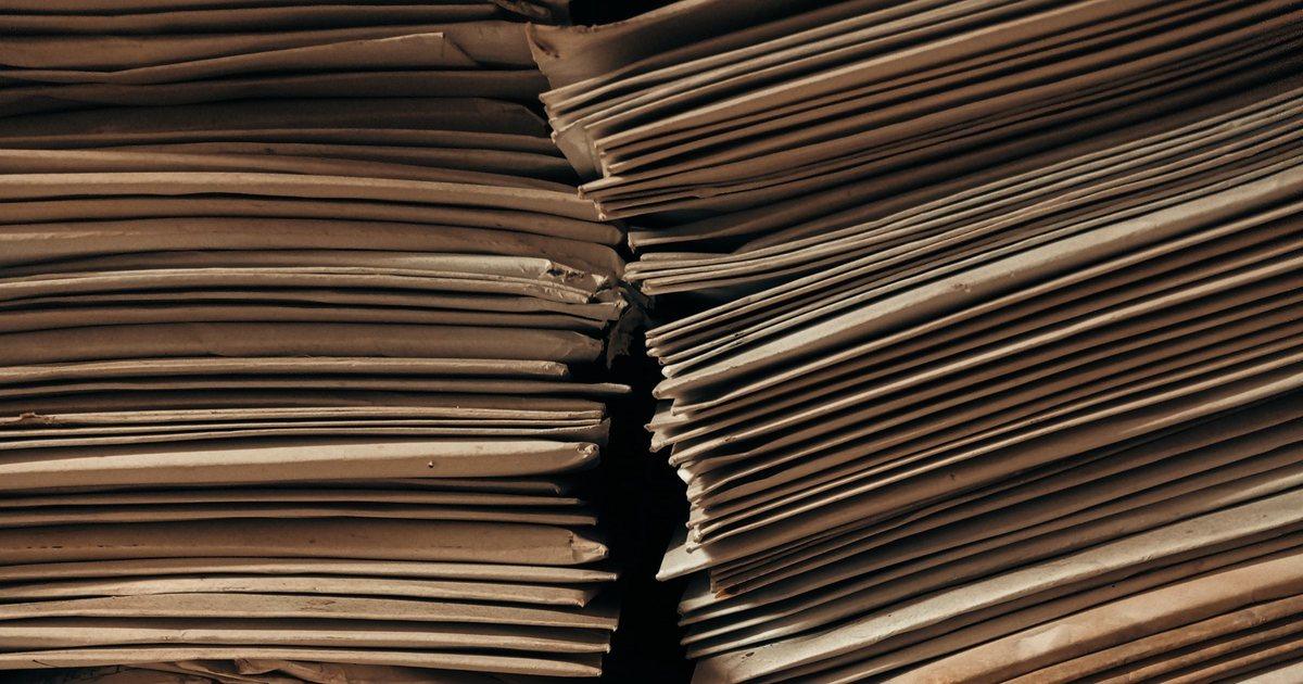 Stacks of aged brown paper envelopes